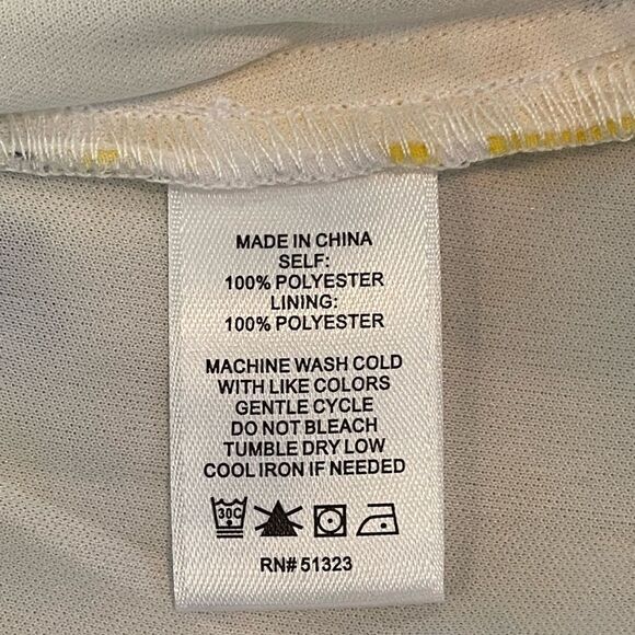 Ce Ce Yellow and Blue Floral Blouse Boat neck with tie hem. - Picture 7 of 9